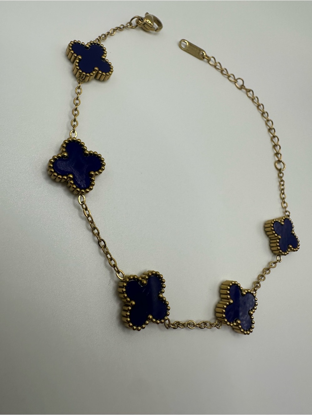 Gold Bracelet with Navy Clover Motifs